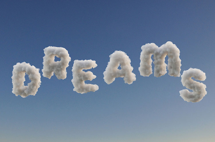 大空に雲で描かれた「Dream」の文字